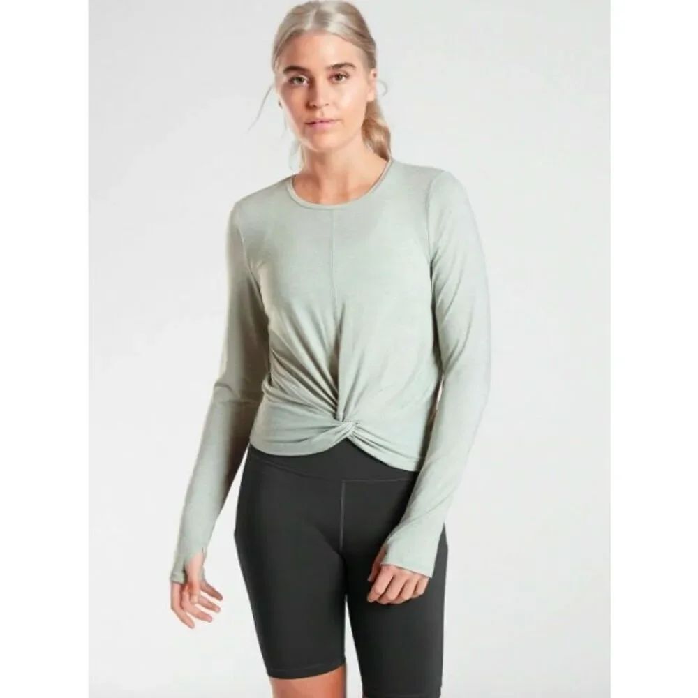 Athleta women’s oga shirt sie XXS long sleeve green, knotted front, thumb holes